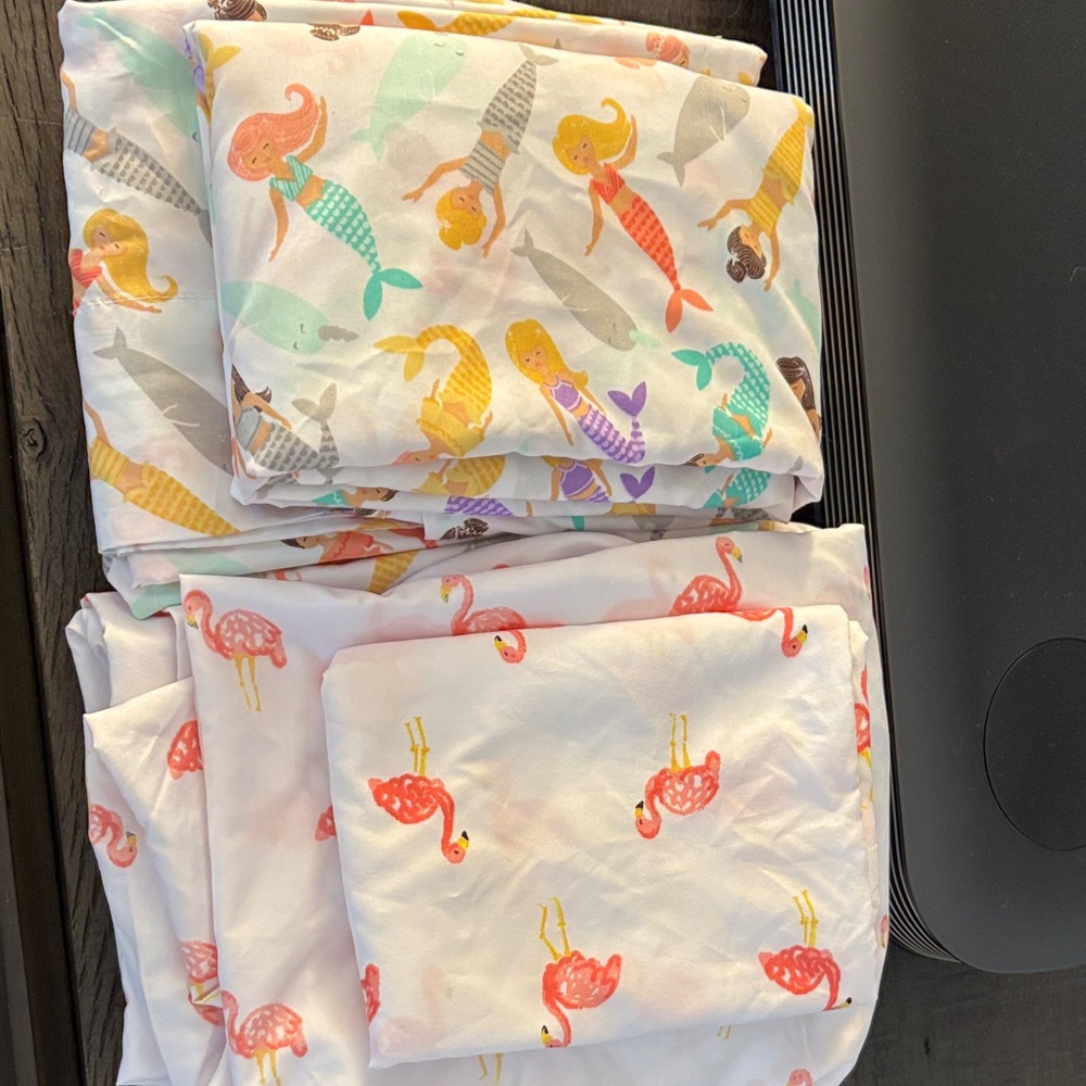 Pillowfort Mermaid and Flamingo Bedding Sets. Both sets are included in sale